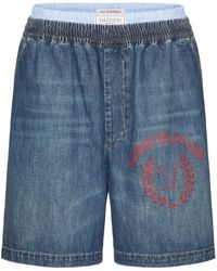 Valentino Garavani - Jeans-Shorts mit Logo-Print - Lyst