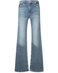 Moschino - Logo-Patch Jeans - Lyst