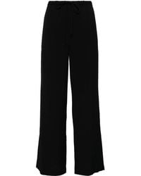 TOTEME - Pantalones a rayas - Lyst