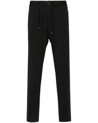 Herno - Pleated Tapered Trousers - Lyst