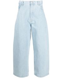 Studio Nicholson - Cropped Wide-Leg Jeans - Lyst