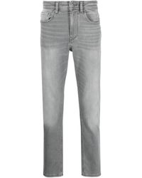 BOSS - Logo-patch Tapered-leg Jeans - Lyst