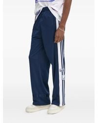 adidas - Pantalones de chándal con tres rayas - Lyst