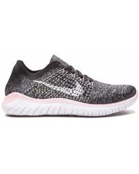 Nike Free Rn Flyknit Sneakers for Women - Up to 5% off at Lyst.com