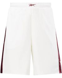 Reebok - Logo-Embroidered Mesh Track Shorts - Lyst