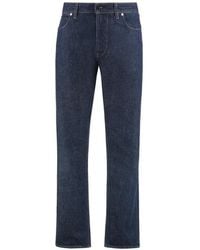 Stone Island - Logo-Patch Straight-Leg Cotton Jeans - Lyst