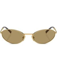Prada - Prada Pr A59S Zonnebril Met Ovalen Montuur - Lyst