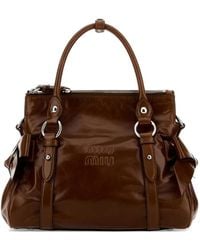 Miu Miu - Bow-Embellished Logo-Embossed Leather Tote Bag - Lyst
