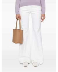 Brunello Cucinelli - Logo-Patch Flared Trousers - Lyst