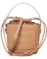 V73 - Logo-Embossed Bucket Bag - Lyst
