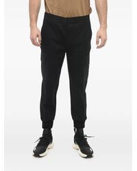Neil Barrett - Low-Rise Skinny-Fit Tapered Trousers - Lyst