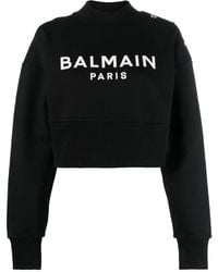 Balmain - "Cropped Sweatshirt mit Knöpfen - Lyst