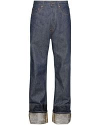 Maison Margiela - Lacquered Jeans mit Umschlag - Lyst