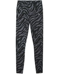 Anine Bing - Black Zebra-print leggings - Lyst