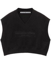 Alexander Wang - Logo-embossed cropped knitted top - Lyst