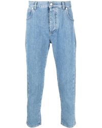 Balmain - Embossed-Logo Slim-Cut Cropped Jeans - Lyst