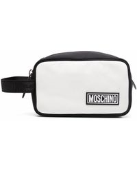 Heren Tassen voor voor Shoppers Moschino Leer Riem Met Logo-reliëf in het Zwart voor heren 