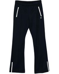 Lacoste - Logo-Embroidered Flared Trousers - Lyst