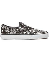 vans skull slip ons