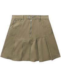 Izzue - Pleated Denim Miniskirt - Lyst