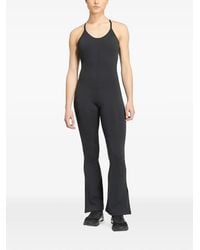 adidas - All Me Flare Open-Back Jumpsuit - Lyst