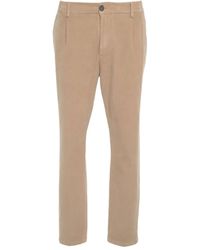 Cruna - Pantalones Mitte con bolsillo plisado - Lyst