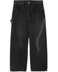 Undercover - Slogan-Print Panelled Jeans - Lyst