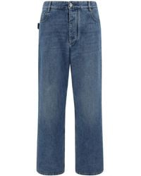 Bottega Veneta - Jeans a gamba ampia con applicazione - Lyst