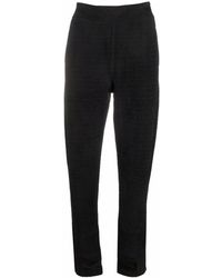 Givenchy - Tapered-Hose mit Monogramm-Print - Lyst