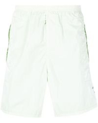 Stone Island - Pantalones cortos de deporte con logo estampado - Lyst
