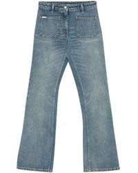 Courreges - ブーツカット ジーンズ - Lyst