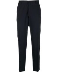 Prada - Tailored Logo-patch Slim Trousers - Lyst