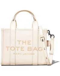 Marc Jacobs - Borsa 'the mini tote bag' con logo in pelle martellata bianca donna - Lyst