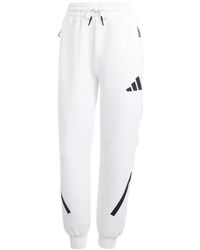 adidas - Zne Logo-Print Stripe-Detail Track Pants - Lyst