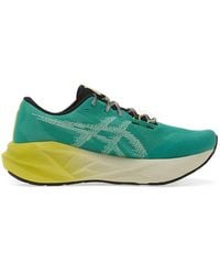 Asics - Novablast Stripe Sneakers - Lyst