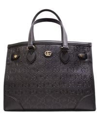Gucci - Bolso shopper mediano con logo GG en relieve - Lyst