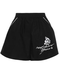 Moschino Jeans - Pantalones cortos con estampado floral - Lyst