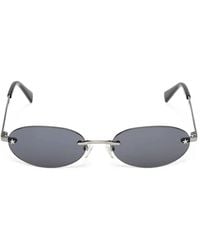 GUESS EYEWEAR - Iris Star-Detail Rimless Sunglasses - Lyst