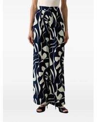 Benetton - Abstract-Print Wide-Leg Trousers - Lyst