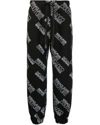 Versace - All-over Logo Track Pants - Lyst