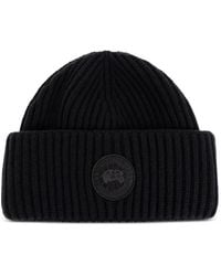 Canada Goose - Logo-Patch Ribbed-Knit Beanie Hat - Lyst