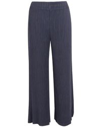 Issey Miyake - Plissé-Effect Trousers - Lyst