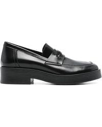 Casadei - Mocasines con placa del logo - Lyst