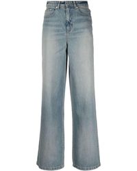 KENZO - Jeans a gamba ampia con applicazione - Lyst