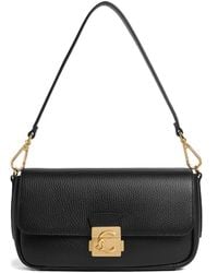 Coccinelle - Medium C-Me Lock logo shoulder bag - Lyst