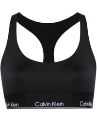 Calvin Klein - Top sportivo con logo - Lyst