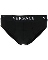Versace - Slip mit Logo-Borte - Lyst