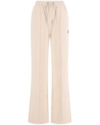 Moncler - Drawstring-Waist Flared Trousers - Lyst