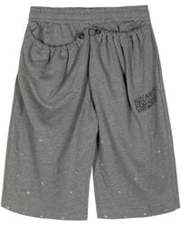 Natasha Zinko - Slogan-Print Distressed Cotton Track Shorts - Lyst