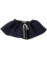Miu Miu - Minifalda con aplique del logo - Lyst